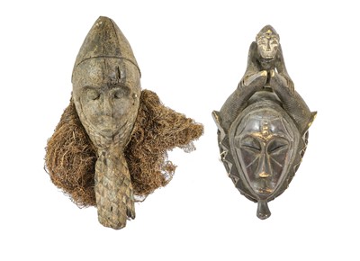 Lot 2388 - A 19th Century African Mask, possibly Ivory...