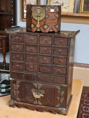 Lot 1174 - A Chinese apothecary cabinet and a Korean hat...