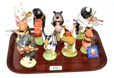 Lot 230 - Nine Beswick Pig Band figures, all boxed