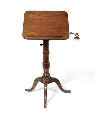 Lot 1200 - A George III Mahogany Reading/Writing Table, late 18th century, the hinged top with ratchet support