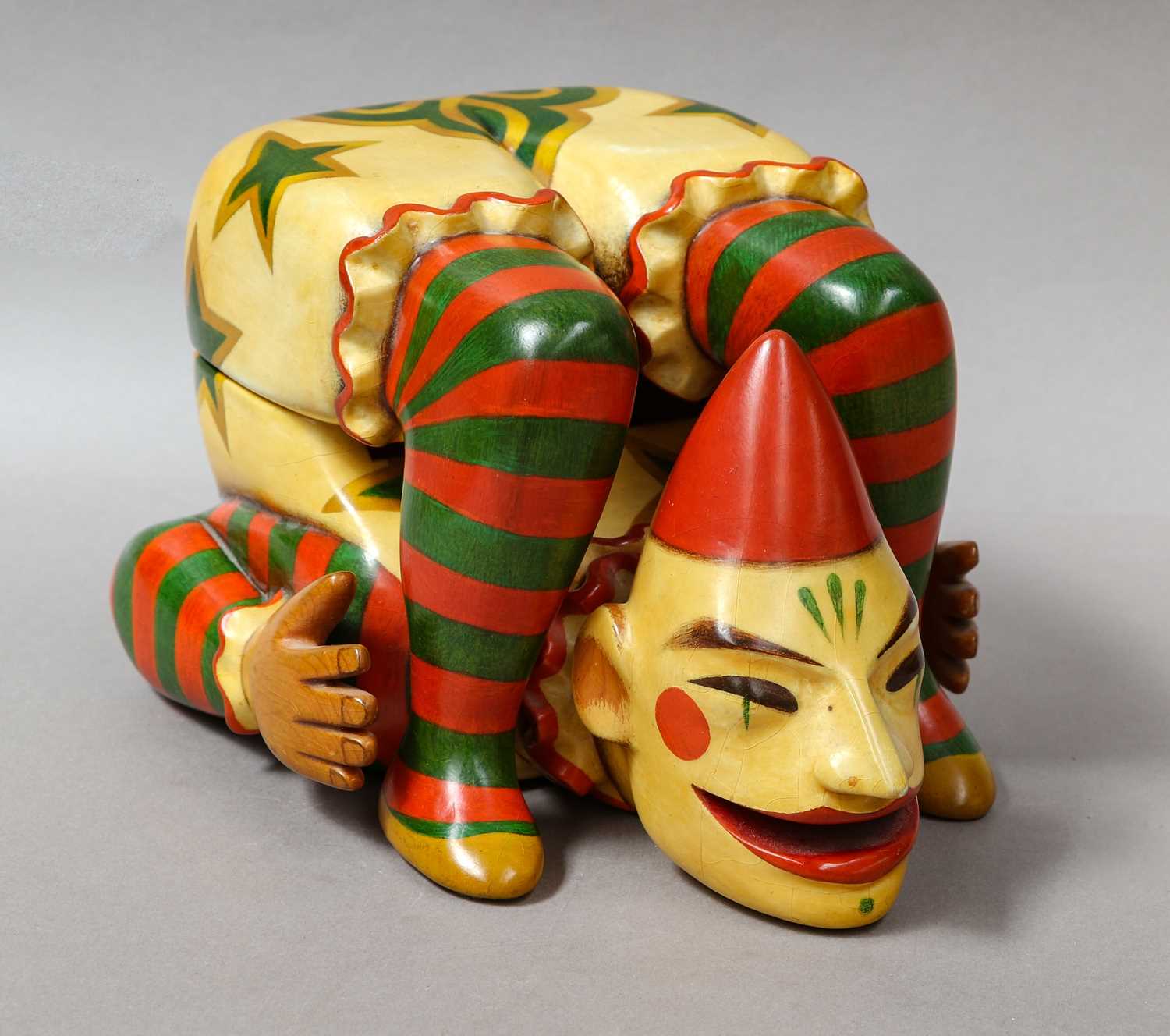 Lot 91 - A hand carved and painted clown form box by...