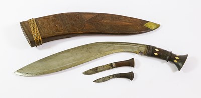 Lot 2362 - An Indian Large Kukri, the 39.5cm curved steel...