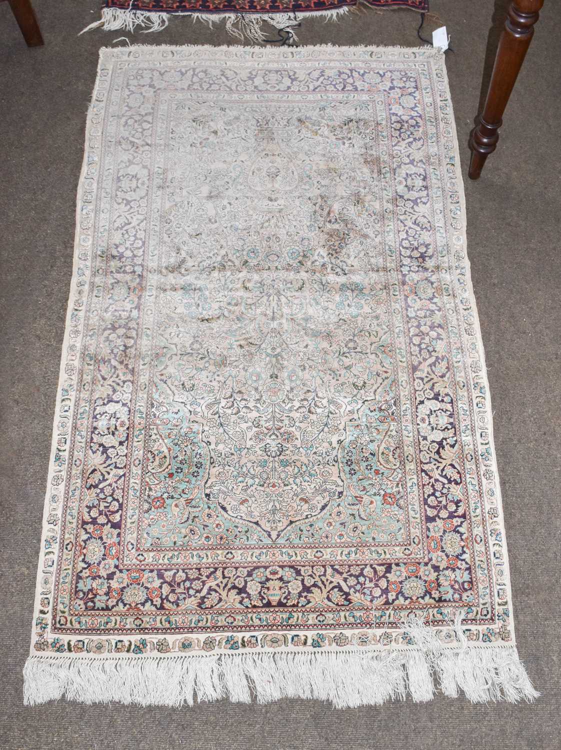 Chinese Prayer Rug Lot 1237 - A Chinese silk prayer rug, the faded rose