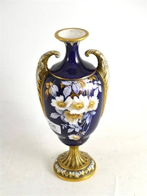 Lot 238 - A Royal Worcester porcelain blue ground Wild Rose painted vase