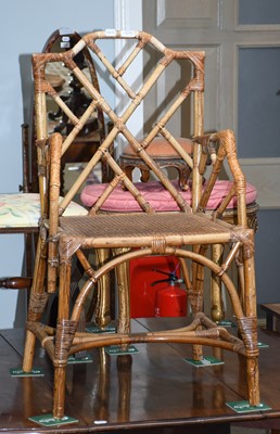 Lot 1076 - An Aesthetic style bamboo and cane armchair