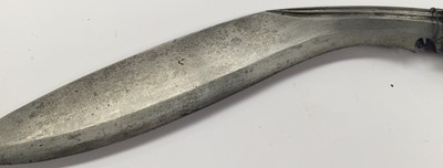 Lot 2365 - A Late 19th Century Nepalese Kukri, each side...