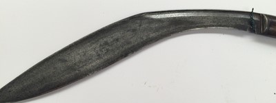 Lot 2365 - A Late 19th Century Nepalese Kukri, each side...