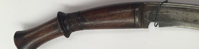 Lot 2365 - A Late 19th Century Nepalese Kukri, each side...