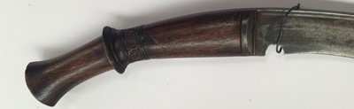 Lot 2365 - A Late 19th Century Nepalese Kukri, each side...