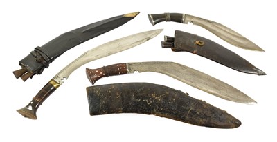 Lot 2366 - A Small Kukri, the 23cm curved steel blade...