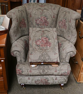 Lot 1277 - A pair of modern Georgian style wingback...