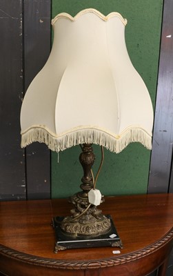 Lot 1067 - A modern brass desk lamp with green glass...