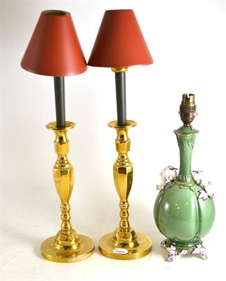 Lot 250 - A Royal Worcester green ground table lamp (a.f.) and a pair of brass candle lamps and shades