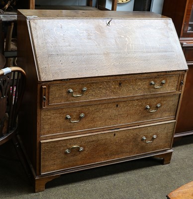 Lot 1267 - A George III oak bureau, 107cm by 57cm by...