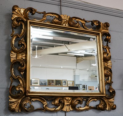 Lot 1183 - A 19th century gilt framed rococo style mirror...