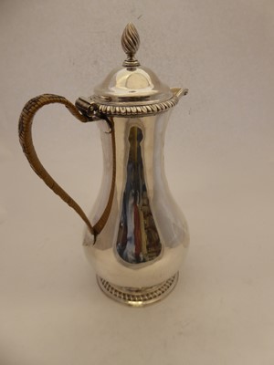 Lot 2193 - A George III Silver Hot-Water Jug