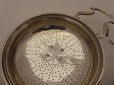 Lot 2192 - A George III Silver Lemon-Strainer