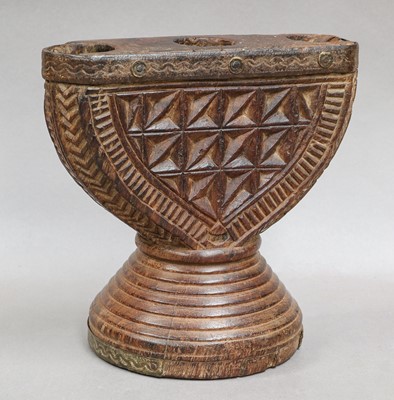 Lot 225 - An antique wooden chip carved stand, possibly...
