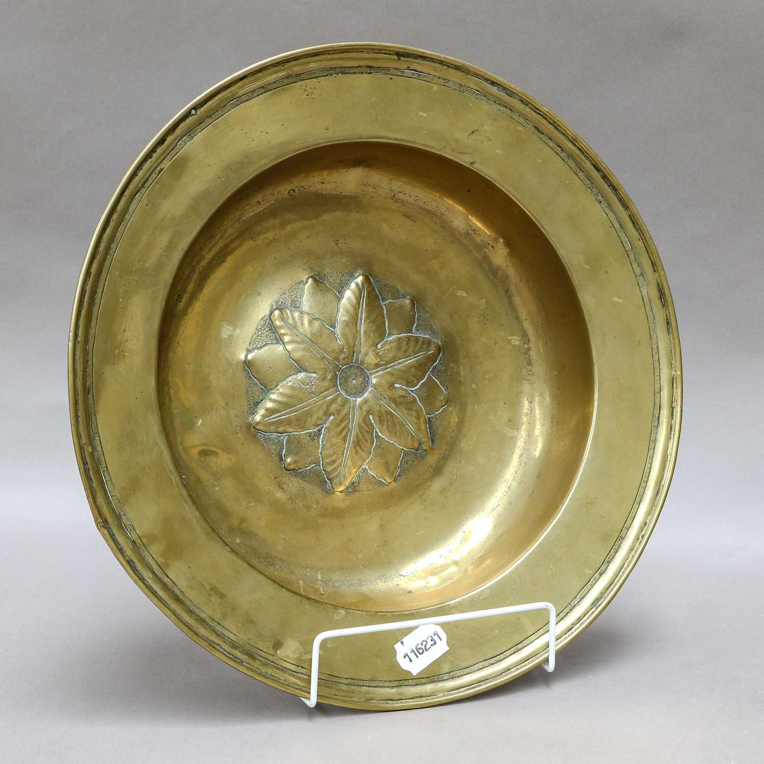 Lot 199 - A 17th/18th century brass alms bowl, the...