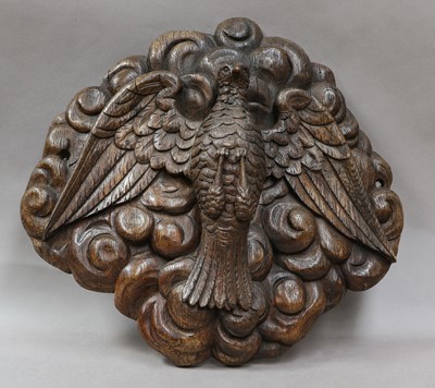 Lot 231 - An oak wall applique, intricately carved with...