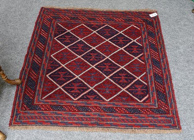 Lot 1084 - An Afghan Baluch piled and flat woven sofreh,...