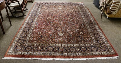 Lot 1087 - A finely woven Indian carpet, the fox brown...