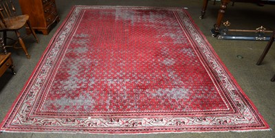 Lot 1089 - A Mir/Serabend carpet, the scarlet field with...