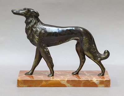 Lot 405 - An Art Deco style patinated metal figure of a...