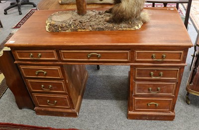 Lot 1103 - A 20th century kneehole desk, 122cm by 56cm by...