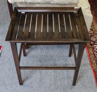 Lot 1125 - A stained and slatted console table, 137cm by...