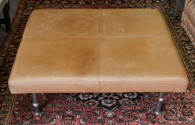 Lot 1127 - A tan leather oversized footstool, 101cm...