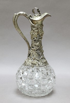 Lot 183 - A silver-plated and cut glass decanter