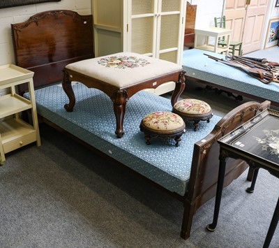 Lot 1144 - A pair of Heal & Sons mahogany single beds,...