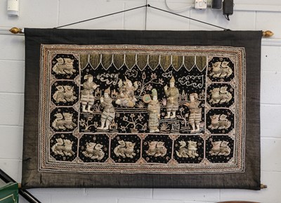 Lot 1255 - A South East Asian silkwork panel, decorated...