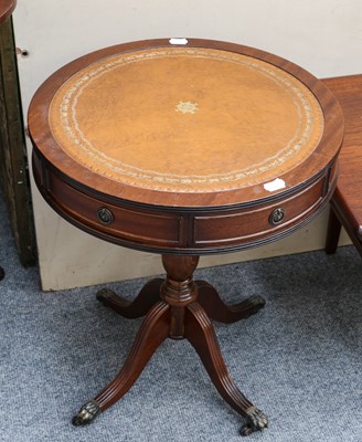 Lot 1163 - A 1970's teak coffee table with canework shelf...