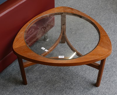 Lot 1159 - A 1960's teak and glass coffee table, the...