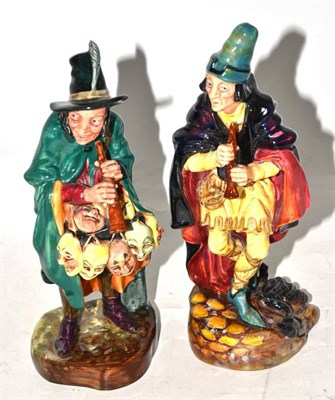 Lot 289 - Two Royal Doulton figures - 'The Pied Piper' HN2102 and 'The Mask Seller' HN2103