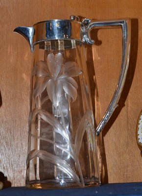 Lot 291 - An Art Nouveau silver mounted cut glass claret jug