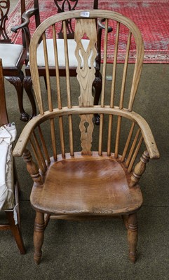 Lot 1236 - A 19th century elm Windsor chair