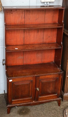 Lot 1186 - A mahogany waterfall bookcase, 66cm by 30cm by...