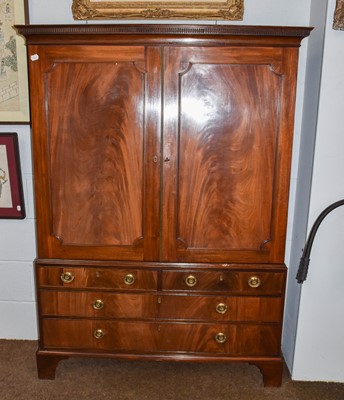 Lot 1282 - A Georgian style mahogany bookcase with two...