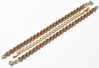 Lot 310 - Two 9 carat gold rope twist bracelets, lengths...