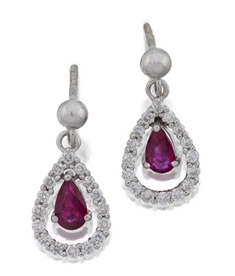 Lot 2151 - A Pair of 18 Carat White Gold Ruby and Diamond Drop Earrings