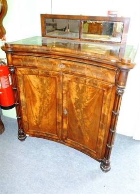 Lot 1207 - A George IV Mahogany Chiffonier, 2nd quarter 19th century, of concave shaped form with mirrored...