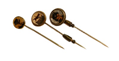 Lot 249 - Two rock crystal reverse intaglio stickpins;...