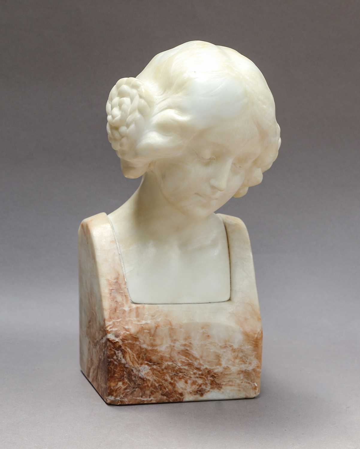 Lot 119 - A marble bust of a maiden, signed to the reverse