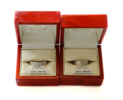 Lot 332 - Two Irish 14 carat white gold band rings,...