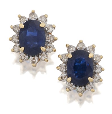 Lot 2105 - A Pair of Sapphire and Diamond Cluster Earrings