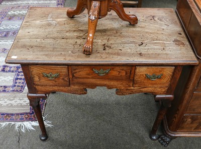 Lot 1206 - A Georgian oak lowboy, 87cm by 49cm by 72cm