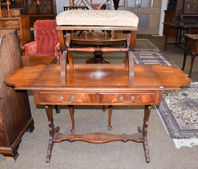 Lot 1253 - A reproduction mahogany sofa table, 145cm...